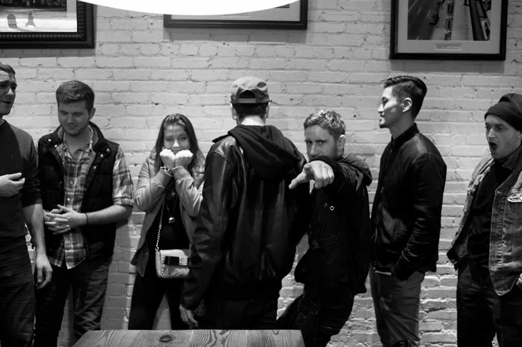 Excited customers lining up outside a popular pizza store, showing the success of a great pizza franchise opportunity.